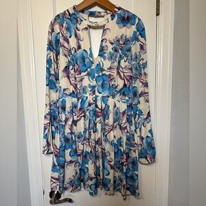 Free People Blue Floral Long Sleeve Mini Dress with Keyhole Neckline and pockets